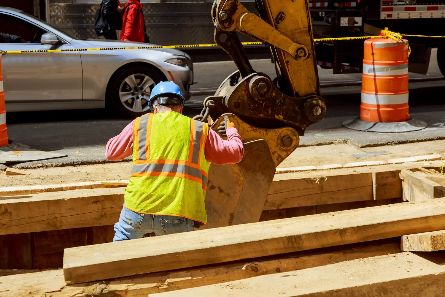 Excavator dug a trench for replacement old pipes repair of city communications pipeline installation